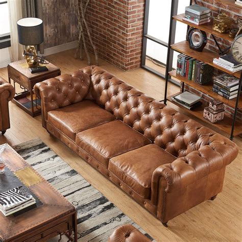 tan leather chesterfield style sofa.